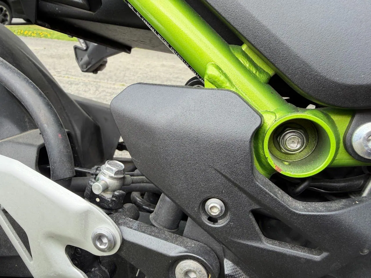 Motorcycle drivetrain and frame detail used for chain service education